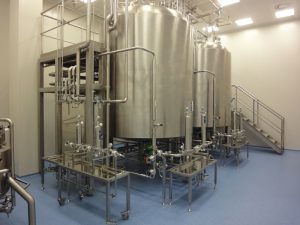 Skladová a výrobní hala, areál IMUNA PHARM, a.s.